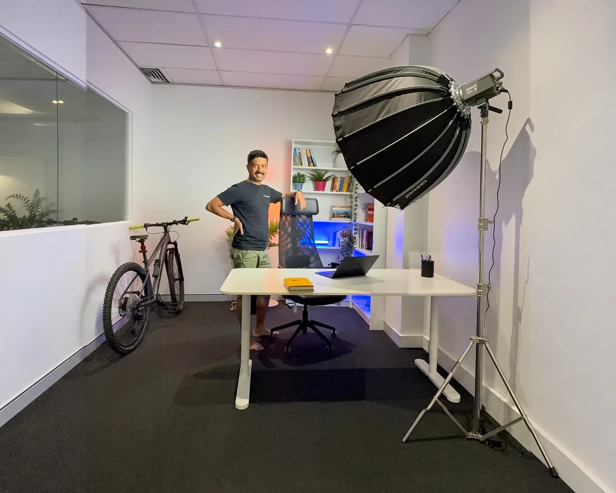 Nirmal Gyanwali in his video studio with a lighting setup
